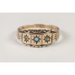 EDWARDIAN 9ct GOLD RING gypsy set with a tiny turquoise flanked by two tiny white stones, Birmingham