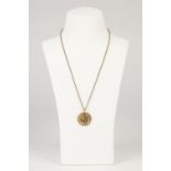 ELIZABETH II GOLD SOVEREIGN, 1958, loose framed as a pendant and the 9ct gold rope pattern necklace,