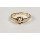 GOLD RING, set with a small solitaire diamond, approx .07ct, 2.3gms