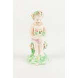 EARLY DERBY PORCELAIN ALLEGORICAL FIGURE OF SUMMER, modelled as a putto with flowers, 4 ¼" (10.