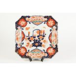 JAPANESE LATE MEIJI PERIOD IMARI PORCELAIN SQUARE DISH OR WALL PLAQUE, decorated with a flowering