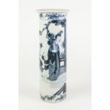 A CHINESE LATE CHING DYNASTY PORCELAIN CYLINDRICAL VASE, painted in underglaze blue with two females