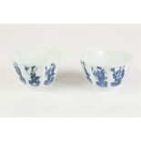 A PAIR OF CHINESE CHING DYNASTY PORCELAIN OCTAGONAL DEEP BOWLS, with fluted rims, painted in