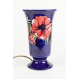 WALTER MOORCROFT ANEMONE PATTERN TUBE LINED POTTERY UPLIGHTER TABLE LAMP, modelled a slightly flared