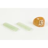 A PAIR OF CHINESE MUTTON FAT/PALE GREEN JADE PLAIN SEALS of flattened oblong form, 2 3/4" (7cm)