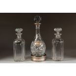 MODERN PEAR-SHAPE CUT GLASS DECANTER WITH SILVER COLLAR AND MATCHING WINE LABEL and SILVER