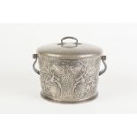 EARLY 1900s TUDRIC PEWTER BISCUIT CONTAINER WITH SWING HANDLE AND REMOVABLE COVER, the planished