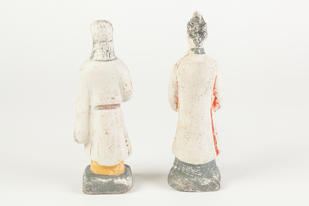A PAIR OF AGED CHINESE WHITE CHALK SURFACED TERRACOTTA BISCUIT ATTENDANT FIGURES with remnants of - Image 2 of 2