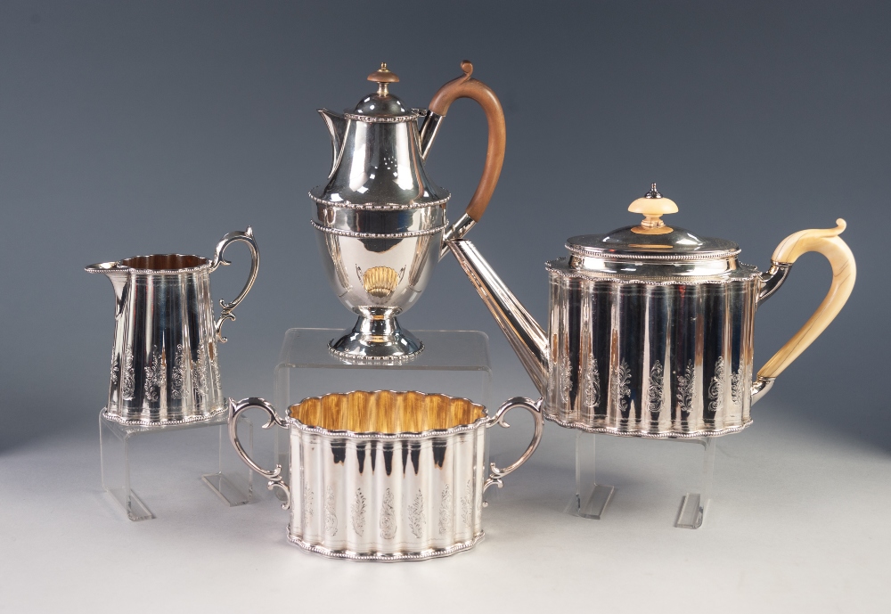 AN EDWARDIAN ELKINGTON AND CO., ELECTROPLATED THREE PIECE TEA SERVICE of fluted oval form, the