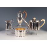 AN EDWARDIAN ELKINGTON AND CO., ELECTROPLATED THREE PIECE TEA SERVICE of fluted oval form, the
