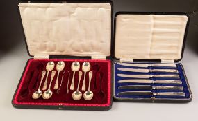 INCOMPLETE CASED SET OF SILVER TEASPOONS AND SUGAR TONGS, originally twelve spoons, now eight,