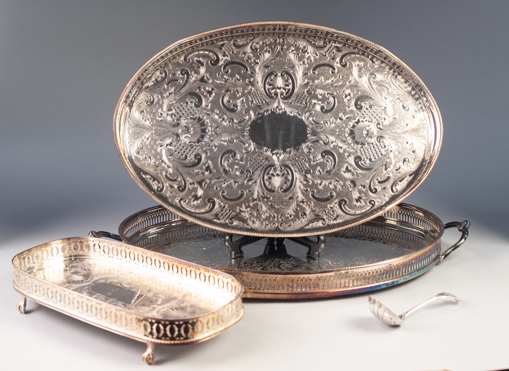 THREE OVAL AND ROUNDED OBLONG GALLERIED TRAYS and a plated SIFTER SPOON (4)