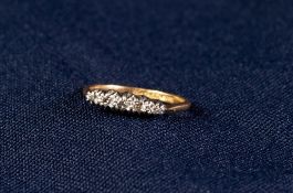 15ct GOLD AND PLATINUM RING set with five tiny diamonds, 2.1 gms gross