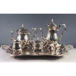 FOUR PIECE ELECTROPLATED TEA AND COFFEE SET, of baluster form with ornate scroll handles and