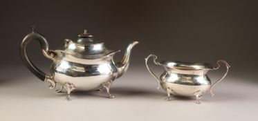 INTER-WAR YEARS SILVER TEAPOT AND MATCHING TWO HANDLED SUGAR BASIN, of rounded oblong form with