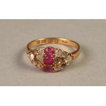 VICTORIAN 18ct GOLD, RUBY AND DIAMOND RING, cross set with three rubies and flanked by a lozenge