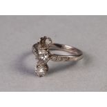 18ct GOLD AND DIAMOND RING, cross set with two diamonds and one vacant setting, the centre diamond