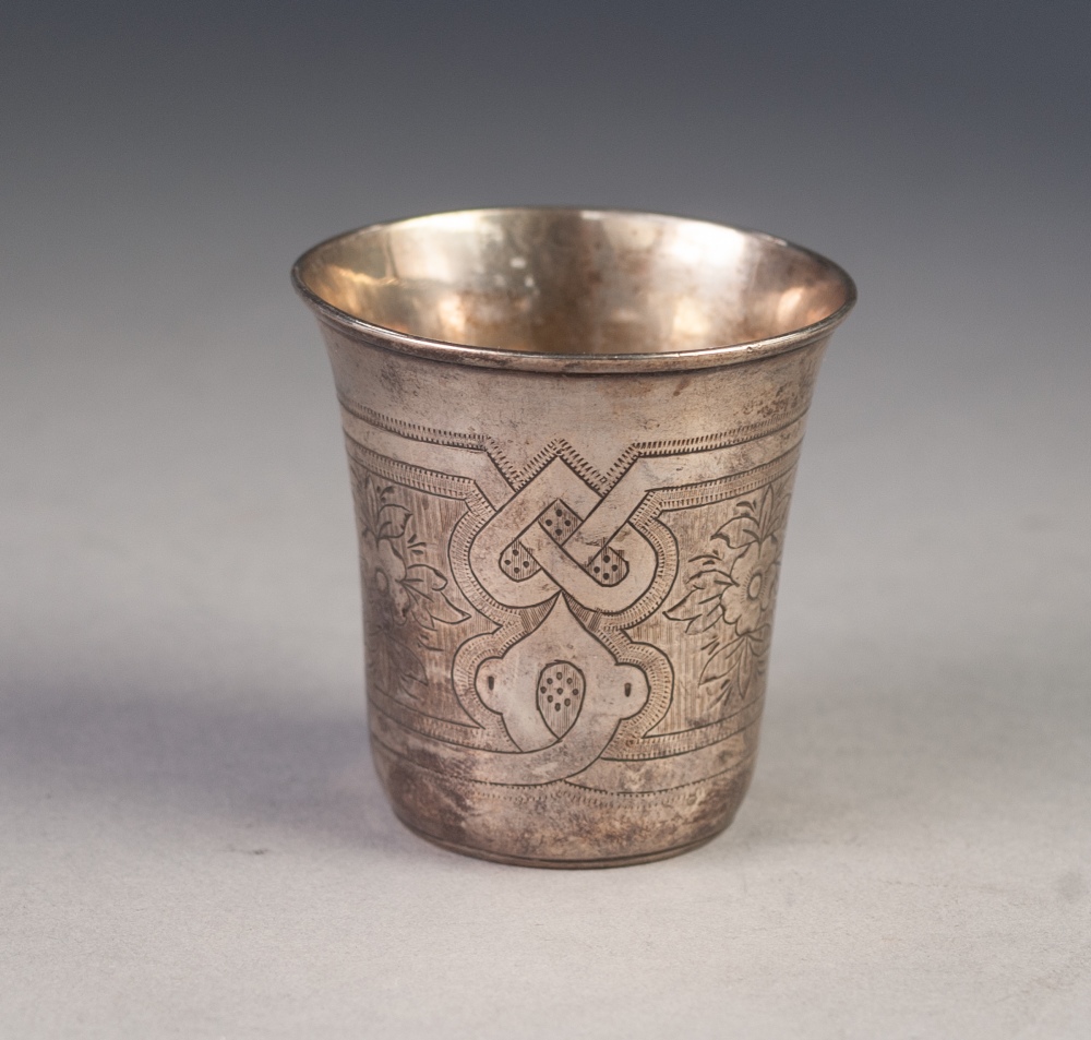 RUSSIAN SILVER SMALL BEAKER, slightly flared, engraved with alternate panels of strapwork and