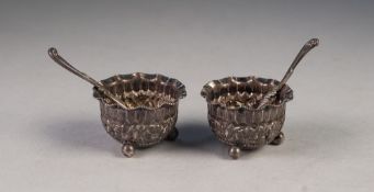 PAIR OF VICTORIAN SMALL CIRCULAR SALT RECEIVERS, repousse with a repeat floral pattern, crimped