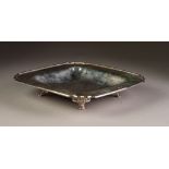 INTER-WAR YEARS SILVER SHAPED SQUARE LOW DISH with Cupid's bow shaped corners, standing on four