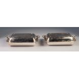 PAIR OF ELECTROPLATED ROUNDED-OBLONG ENTREE DISHES with end handles to the covers (2)