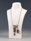 A MODERN CARL BRIDGEMAN CRAFTED SILVER AND HARDSTONE SET NECKLACE, and ANOTHER SILVER AND