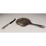 AN EARLY TWENTIETH CENTURY SILVER BACKED HAND MIRROR, Birmingham 1922, ALSO A FILLED SILVER