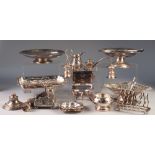 SELECTION OF ELECTROPLATE, inlcuding a desk stand, toast rack, candelabrum (as found), jug, cake