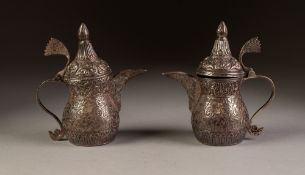 PAIR OF SMALL OTTOMAN STYLE 800 PURITY SILVER INDIVIDUAL COFFEE POTS, chased autour with foliate