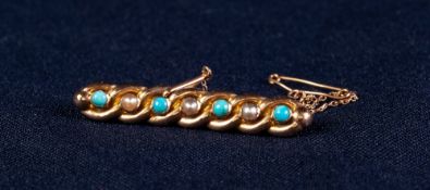 15ct GOLD LINKED BROOCH SET WITH TURQUOISE AND SEED PEARLS with safety chain, 3 gms gross