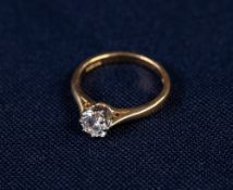 18ct GOLD RING, with a round brilliant cut solitaire diamond, approx .53ct in an eight claw