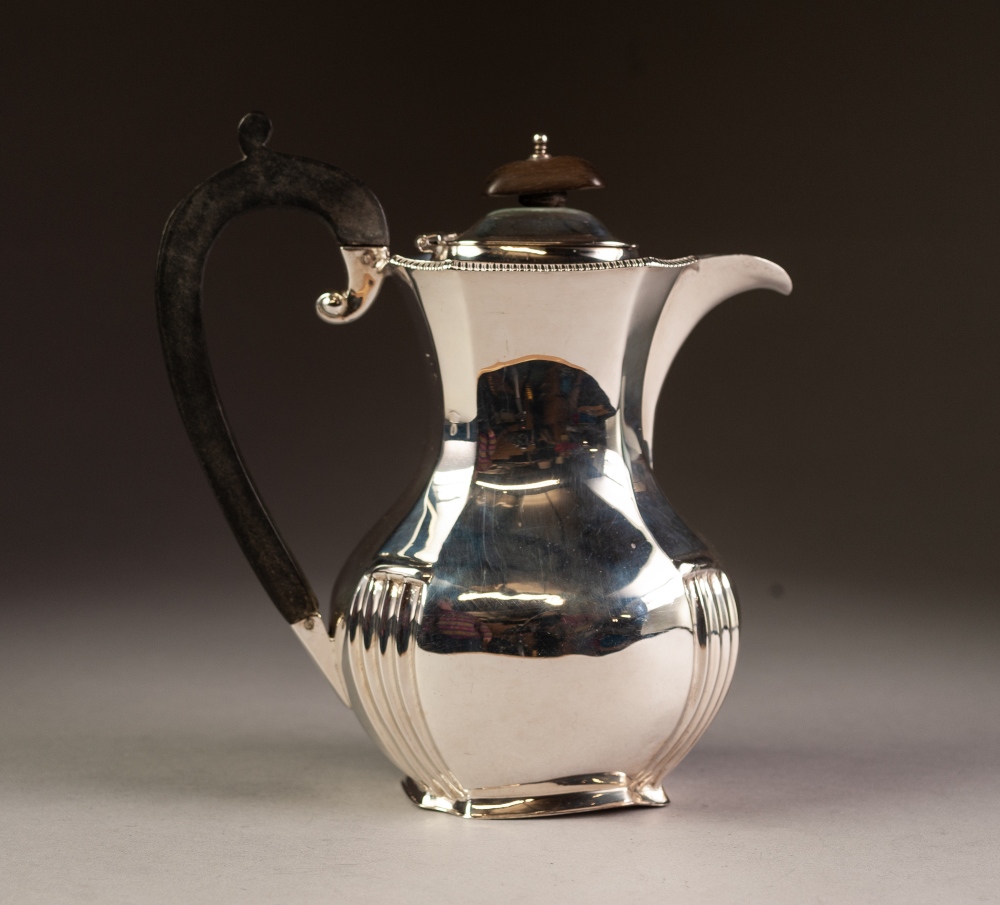 EARLY 20th CENTURY SILVER COFFEE POT of panelled baluster form with narrow gadrooned rim, black wood - Image 2 of 2