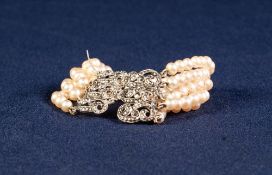 FINE STRAND SIMULATED PEARL AND WHITE METAL MARCASITE SET CLASPED BRACELET