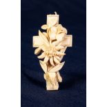 NINETEENTH CENTURY EUROPEAN CARVED IVORY CROSS PENDANT, with an Edelweiss in free relief, 2 3/4"