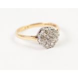 18ct GOLD, PLATINUM AND DIAMOND DAISY CLUSTER RING set with 9 brilliant cut diamonds, approx .60ct