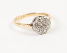 18ct GOLD, PLATINUM AND DIAMOND DAISY CLUSTER RING set with 9 brilliant cut diamonds, approx .60ct