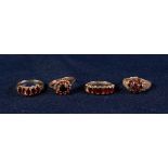 FOUR 9ct GOLD GARNET SET DRESS RINGS, 11.6 gms all in gross (4)