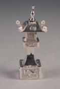 CHINESE STERLING SILVER PAGODA PATTERN PEPPERETTE, with sliding panel to the base, 3 ¼" (8.3cm)