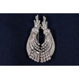 WHITE GOLD AND DIAMOND DOUBLE CLIP BROOCH COMPOSED OF TWO CURVING SPRAYS SET WITH BRILLIANT,