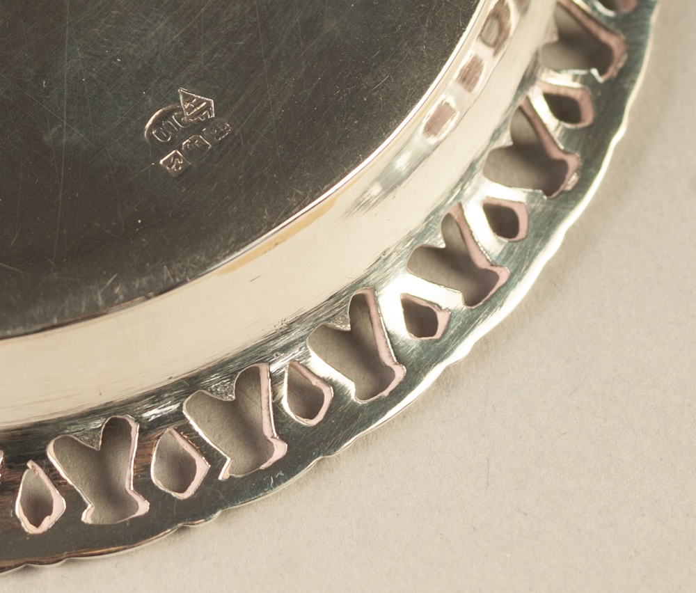 FOREIGN 900 STANDARD SILVER COLOURED METAL CIRCULAR TRAY STAND OF HEAVY GAUGE, with plain centre and - Image 2 of 2