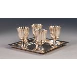 TIFFANY & Co STERLING SILVER SET OF FOUR EGG CUPS ON A SQUARE TRAY PATTERN STAND, the egg cups