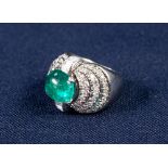 PLATINUM, EMERALD AND DIAMOND COCKTAIL RING, WITH A CABOCHON OVAL NATURAL EMERALD OF VERY STRONG