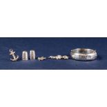 MODERN SILVER STIFF BANGLE, TWO SILVER THIMBLES and THREE SILVER AND WHITE METAL anchor, maple