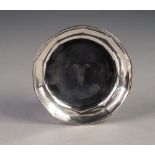 SILVER NUT DISH, with panelled sides and monogrammed centre, 3" (7.6cm) diameter, London 1958, 1.