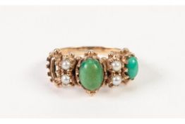 9ct GOLD DRESS RING, with a fancy setting of two oval cabochon oval turquoise (one turquoise