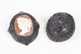 VICTORIAN OVAL SHELL CAMEO BROOCH, carved with a classical female head, facing sinister in carved
