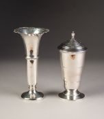 AN ART DECO SILVER SUGAR CASTOR, lined in cream thermo plastic with screw on perforated cover,