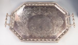 VICTORIAN ELECTROPLATED CANTED RECTANGULAR TWO HANDLED TEA TRAY, the centre engraved with foliate