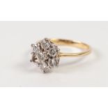 18ct GOLD AND DIAMOND DAISY CLUSTER RING, set with six (of seven) diamonds, London import mark 1990,