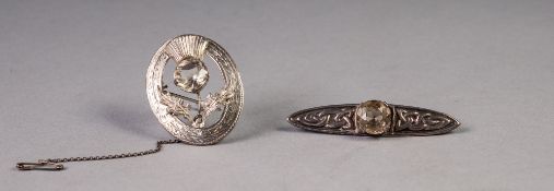 SCOTTISH SILVER OVAL OPENWORK BROOCH, the thistle centre set with a Cairngorm, Edinburgh 1962 and